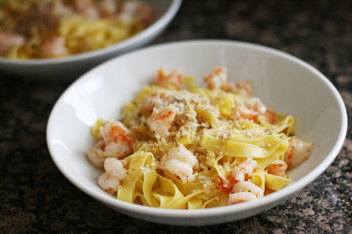 Shrimp pasta with parmesan and ground walnuts