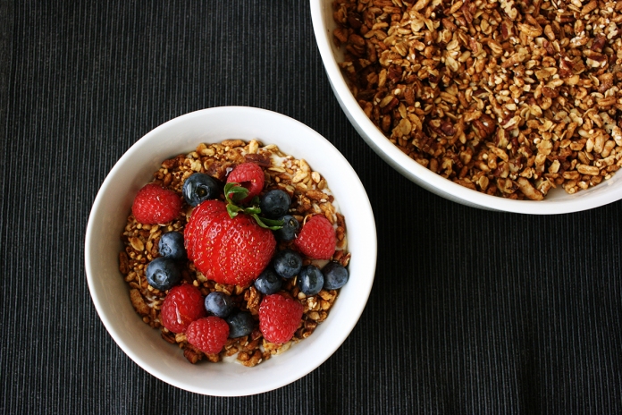Favorite granola with puffed grains, pecans, maple syrup, and honey on alickofsalt.com